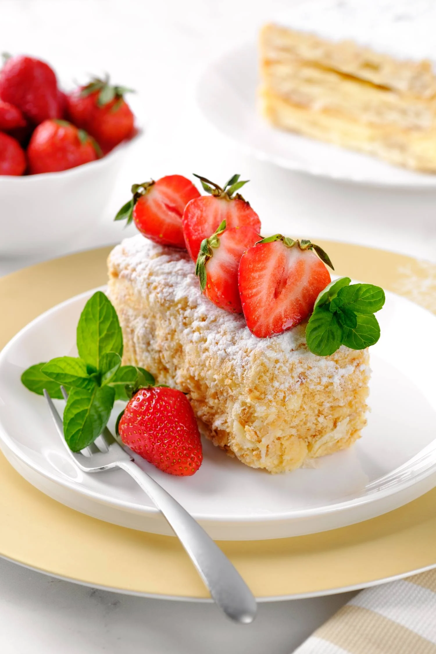 a-slice-of-napoleon-cake-with-strawberries-and-min-2022-01-28-21-56-52-utc (1)